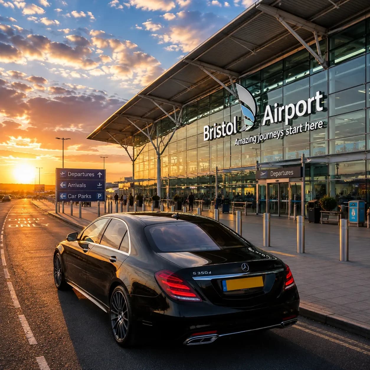 A dark Mercedes saloon photographed from the front